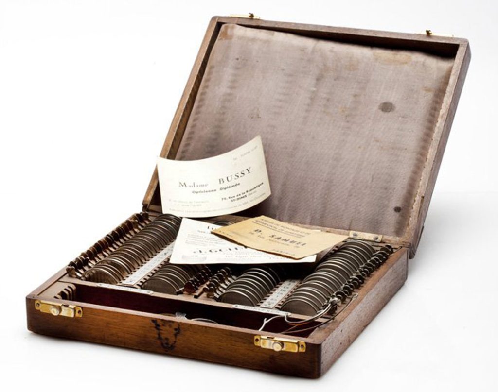 Case containing lenses for eye examinations that belonged to the optometrist Judith Samuel - Claude Samuel's grandmother. France, 1930, Wood, metal and glass