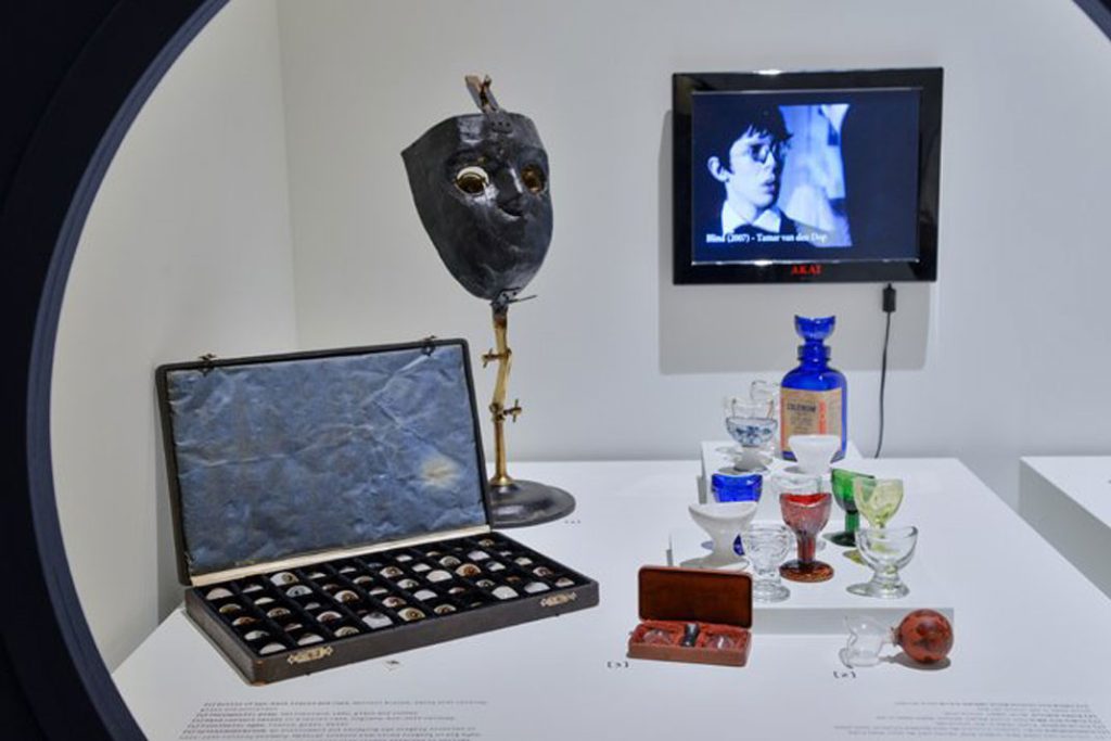 From the exhibition Overview. Left: a box of prosthetic eyes, the latest piece in Claude Samuel's collection | Photographer: Shay Ben-Efraim